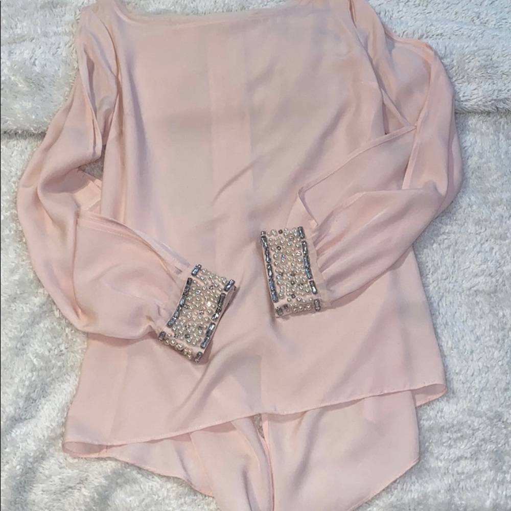 Blush pearl and crystal embellished top.